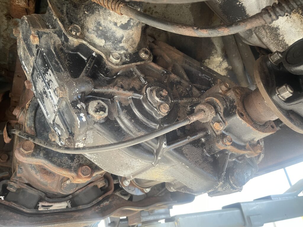 Photo of a vehicles' undercarriage, before being cleaned with a dry ice blasting service.