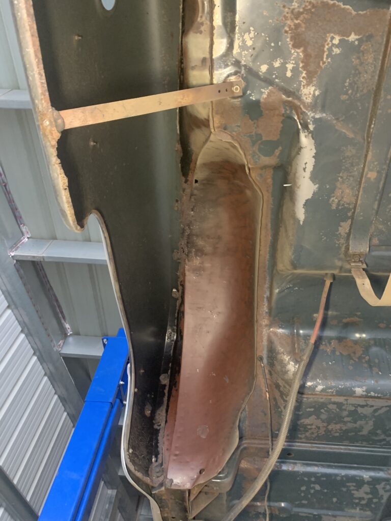 Wheel well on a truck after being dry ice blasted