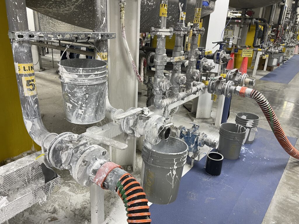Paint factory equipment before being dry ice blasted